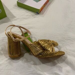 Brand new gold crisscrossed strap heels